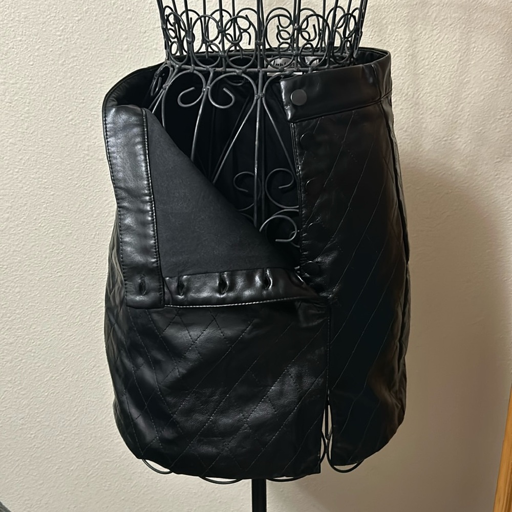 Leather black skirt small with buttons on the side